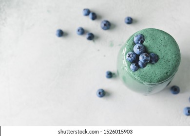 Jar Of Healthy Spirulina Smoothie On Table