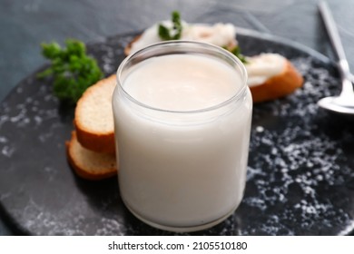 Jar Of Lard Spread On Black Background