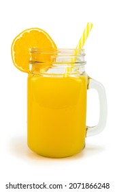 A Jar Of Orange Juice With A Straw And An Orange Slice At The Top. Isolated On White Background.