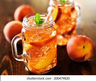 jar of peach tea shot with selective focus