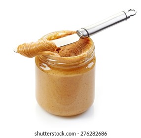 jar of peanut butter on a white background