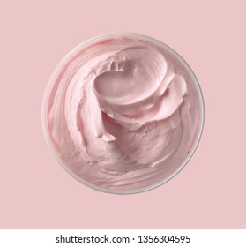jar of pink cosmetic cream body butter on pink background, top view