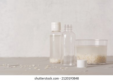 Jar Of Rice Water For Skin Care Face Cleansing Cosmetic Product. Holistic Beauty Concept, Fermented Beauty Care Trend. Copy Space