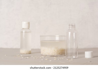 Jar Of Rice Water For Skin Care Face Cleansing Cosmetic Product. Holistic Beauty Concept, Fermented Beauty Care Trend. Copy Space