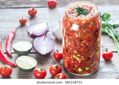 Jar Of Salsa With Ingredients