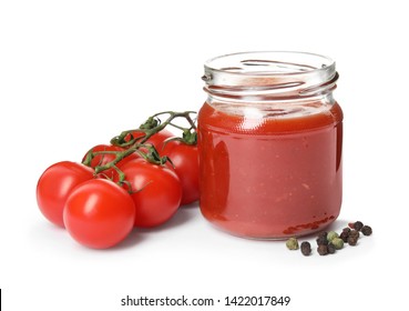 Jar Of Sauce And Tomatoes Isolated On White