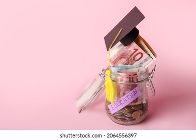 Jar With Savings For Education And Graduation Hat On Color Background