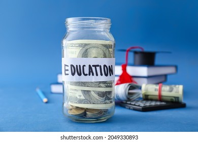 Jar With Savings For Education On Color Background. Tuition Fees Concept