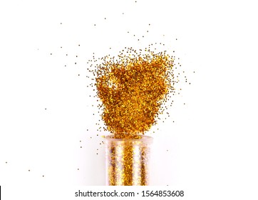 Jar With Spilled Gold Glitter, Shiny Eyeshadows On White Background.