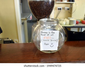 A Jar Suggesting You Cleanse Yourself By Donating A Tip In A Coffee Shop In Winton Outback Queensland