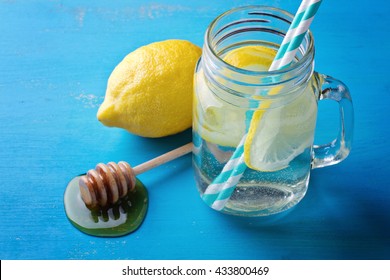 Jar With Water, Lemon And Honey