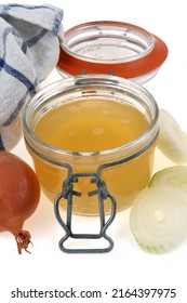 Jar Of White Onion Juice And Its Ingredients On A White Background