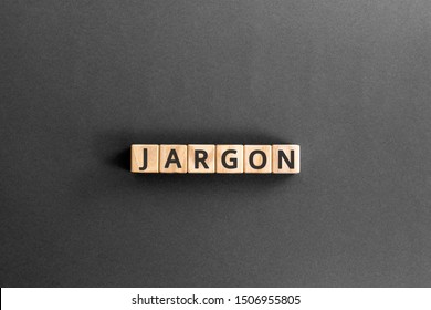 Jargon  - word from wooden blocks with letters,  special words and phrases jargon concept, top view on grey background
