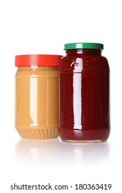 Jars of peanut butter and jelly, cutout on white background