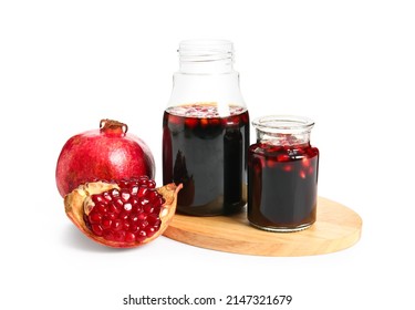 Jars Of Pomegranate Molasses On White Background