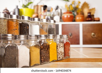 Jars of spices on the table in the kitchen