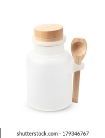 Jars with spoon empty on white background