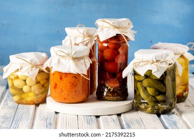 Jars Of Tasty Pickled Vegetables Homemade Canned Food Blue And White Wooden Background Horizontal Harvest