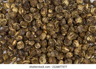 Jasmine Pearls Green Tea on a white background. medicinal asian herbal tea. Close up