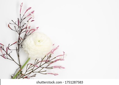 Jasmine and rananculus feminine flat-lay
