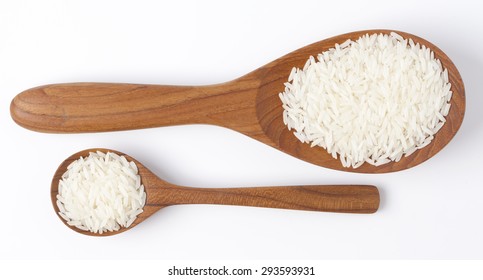 Jasmine Rice In A Wooden Spoon.