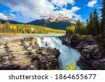 Jasper Park. Rocky Mountains of Canada. The famous rugged Athabasca Falls. Mountains, rivers and waterfalls make up magnificent landscapes. Travel and ecological tourism concept