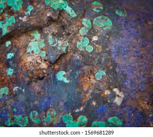 Jasperoidal Outcrop, showing green copper carbonate and blue copper carbonate. Mineral texture background.