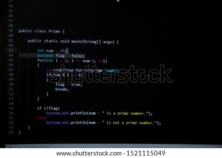 Java code development on monitor programer working on code monitor concept