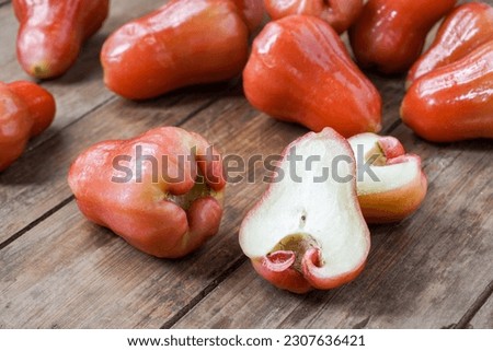 Java Rose Apples or Water Guava. Malaysian people called Jambu Air on wooden table.