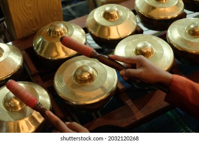 Javanese Musical Instrument Called Bonang And Played By Someone