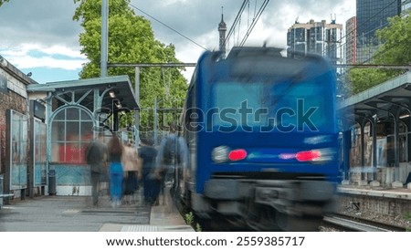 Javel train station with Eiffel tower on background timelapse. French railway station on the Invalides line located in the 15th arrondissement of Paris, in the Javel district. Cloudy sky. France