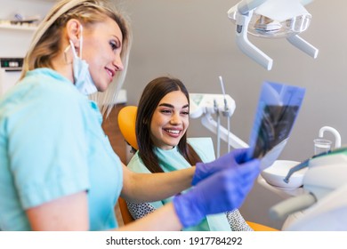 Jaw Scan Is Being Explained By The Dentist To The Patient. . Wearing Protective Masks Respecting The Prescribed Safety Measures Regarding The Covid-19 Pandemic.