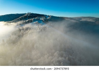 Jaworzyna Mountain Peak Above Clouds. Aerial Drone View.