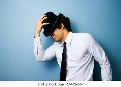 Jazz dancing man tipping his bowler hat - Powered by Shutterstock