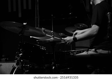  Jazz drummer performing live, focusing on cymbals and drum set. - Powered by Shutterstock