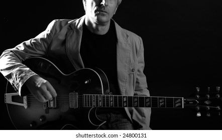 Jazz Guitar Player Playing Classic Instrument