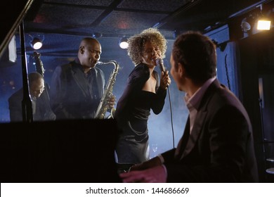 Jazz musicians performing in the club