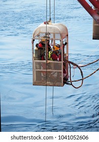 JDA, THAILAND – FEBRUARY, 2018: Air Divers Are Sent Inside A Cage To Perform Subsea Works On February 16, 2018 In Gulf Of Thailand.