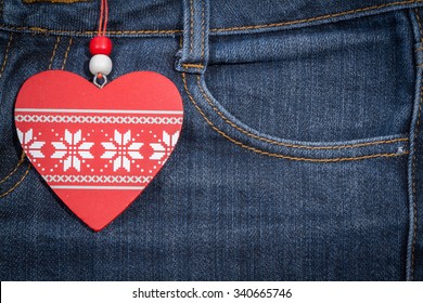 Jeans Background With Wooden Heart. Texture Valentine's Day.