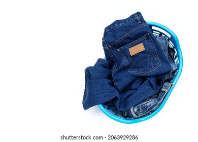 Jeans In Laundry Basket. Top View