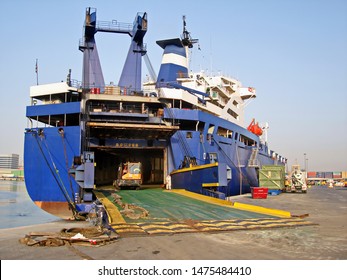 Jebel Ali, UAE, November 15, 2008. Unloading Heavy Equipment And Trucks From The Ro-Ro Vessel In The Port Of Jebel Ali