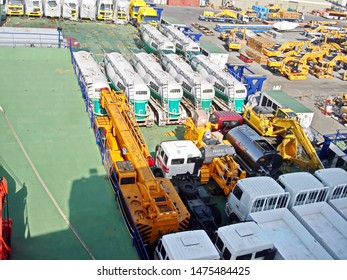 Jebel Ali, UAE, November 15, 2008. Unloading Heavy Equipment And Trucks From The Ro-Ro Vessel In The Port Of Jebel Ali