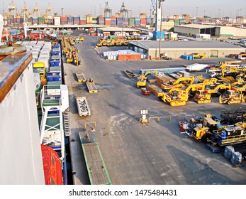 Jebel Ali, UAE, November 15, 2008. Unloading Heavy Equipment And Trucks From The Ro-Ro Vessel In The Port Of Jebel Ali