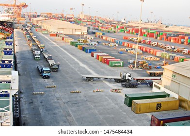 Jebel Ali, UAE, November 15, 2008. Unloading Heavy Equipment And Trucks From The Ro-Ro Vessel In The Port Of Jebel Ali