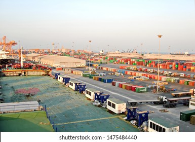 Jebel Ali, UAE, November 15, 2008. Unloading Heavy Equipment And Trucks From The Ro-Ro Vessel In The Port Of Jebel Ali