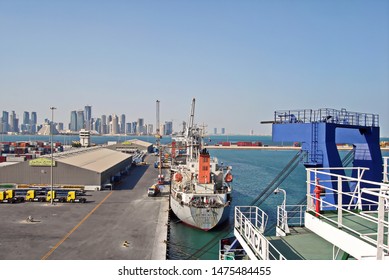 Jebel Ali, UAE, November 15, 2008. Unloading Heavy Equipment And Trucks From The Ro-Ro Vessel In The Port Of Jebel Ali