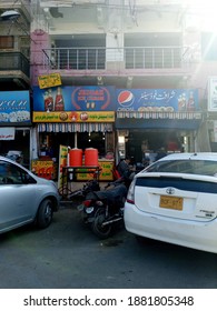 Jedah Ice Cream Shop On A Busy Market . Some Signboards Are In Urdu- Karachi Pakistan - Dec 2020