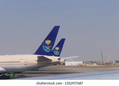 JEDDAH, SAUDI ARABIA – DECEMBER 22, 2018: Two SAUDIA Airplanes On The King Abdulaziz International Airport