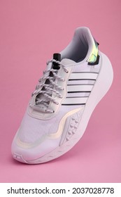 Jeddah Saudi Arabia  September 6 2021  ADIDAS Shoes CHOIGO W On Yellow And Pink Background. Product Shot. Adidas Is A German Corporation That Designs And Manufactures Sports Shoes, Clothing And Access