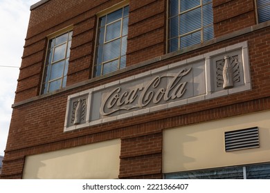 Jefferson City, Missouri - November 12, 2020: The Coke Logo At The Historic Coca-Cola Bottling Plant.